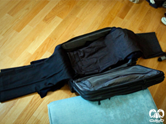 چیدن لباس در چمدان